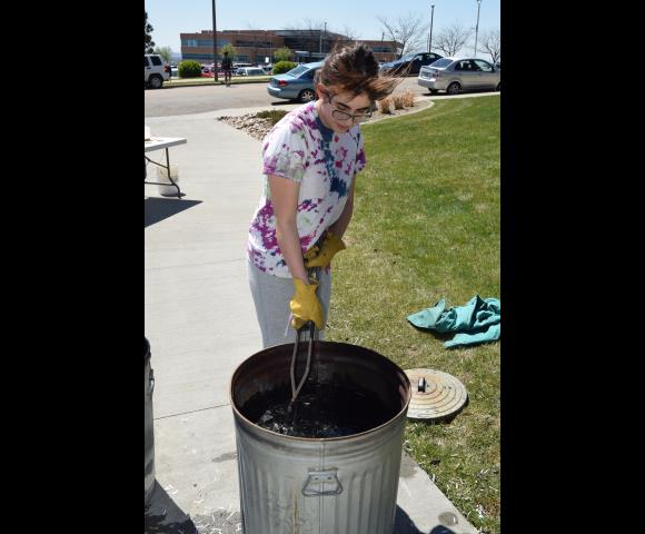 Woman in beginning process of making Raku-Fired Pottery