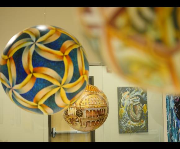 Painted spheres with blue, yellow, orange colors